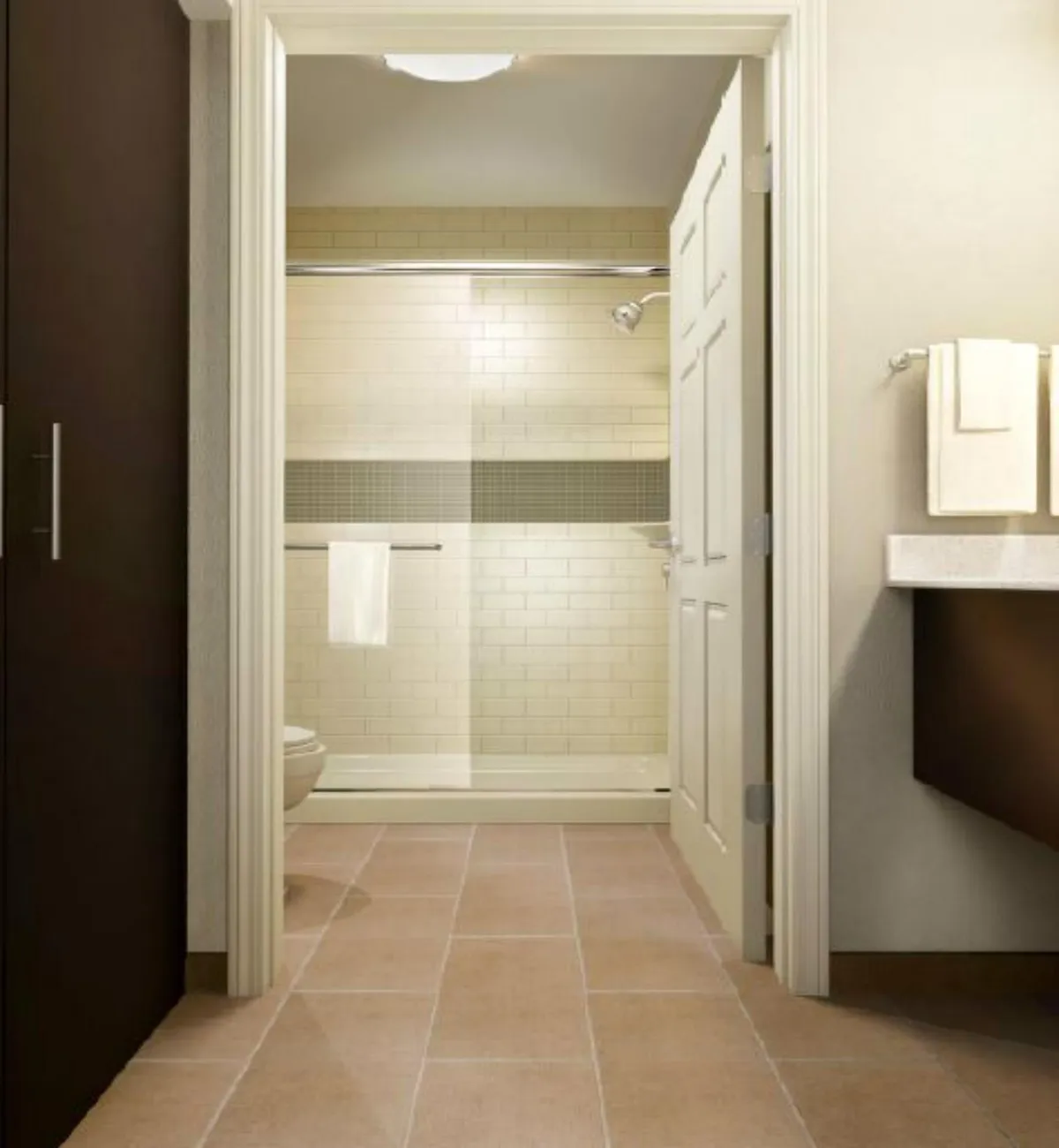 A modern, spa-inspired bathroom showcasing a spacious roll-in shower, a sleek sink with amenities, and neatly arranged towels. The atmosphere is clean and inviting, designed for both style and accessibility, ensuring comfort for every guest.